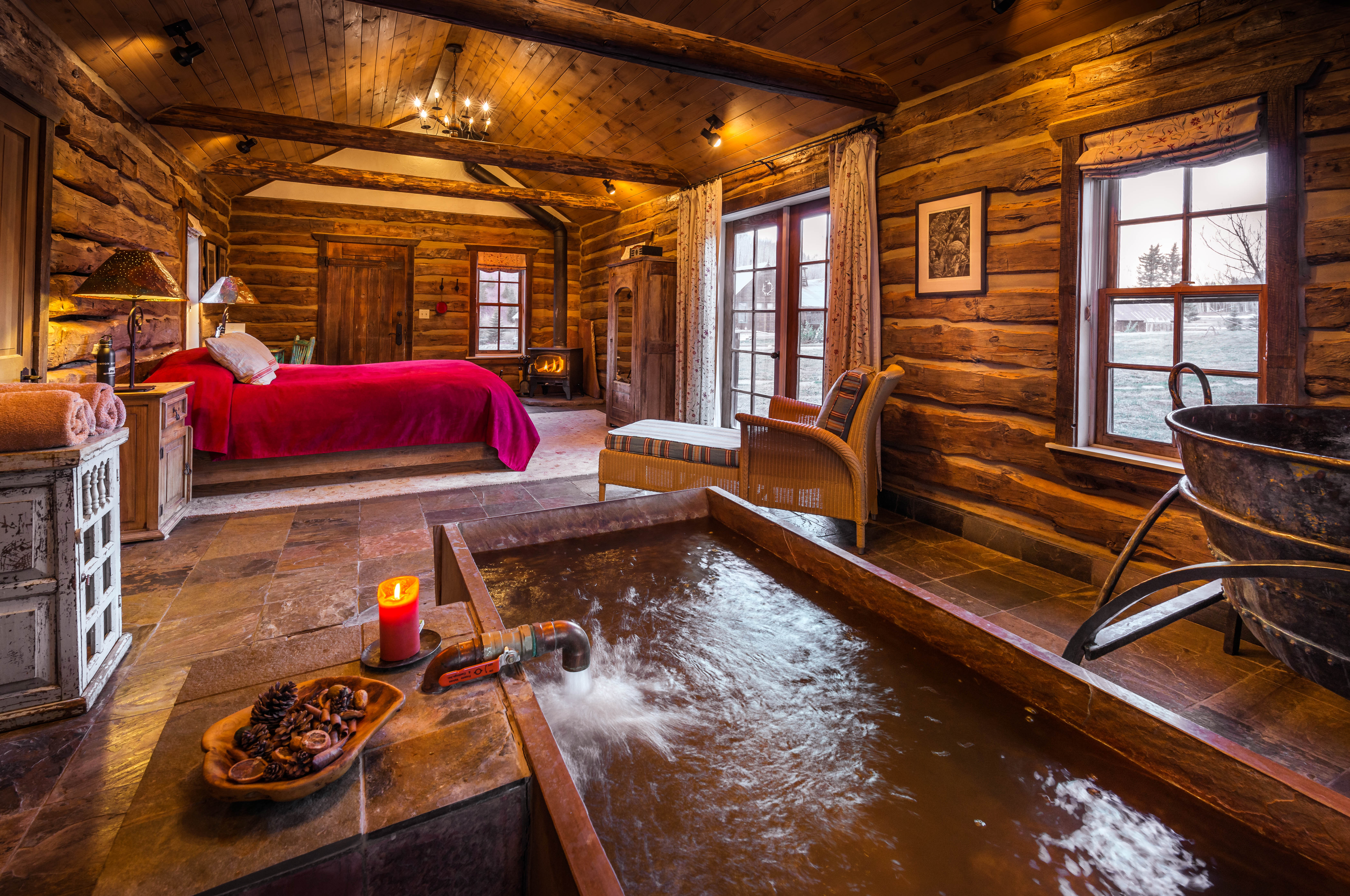 Danton Hot Springs is a meticulously restored 1880s mining town featuring 13 handcrafted luxury cabins.