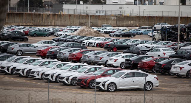 <p>New General Motors vehicles parked at the GM Lansing Grand River Assembly plant as the first day of President Donald Trump's 25 percent tariffs on goods from Canada and Mexico went into effect on March 4, 2025</p>