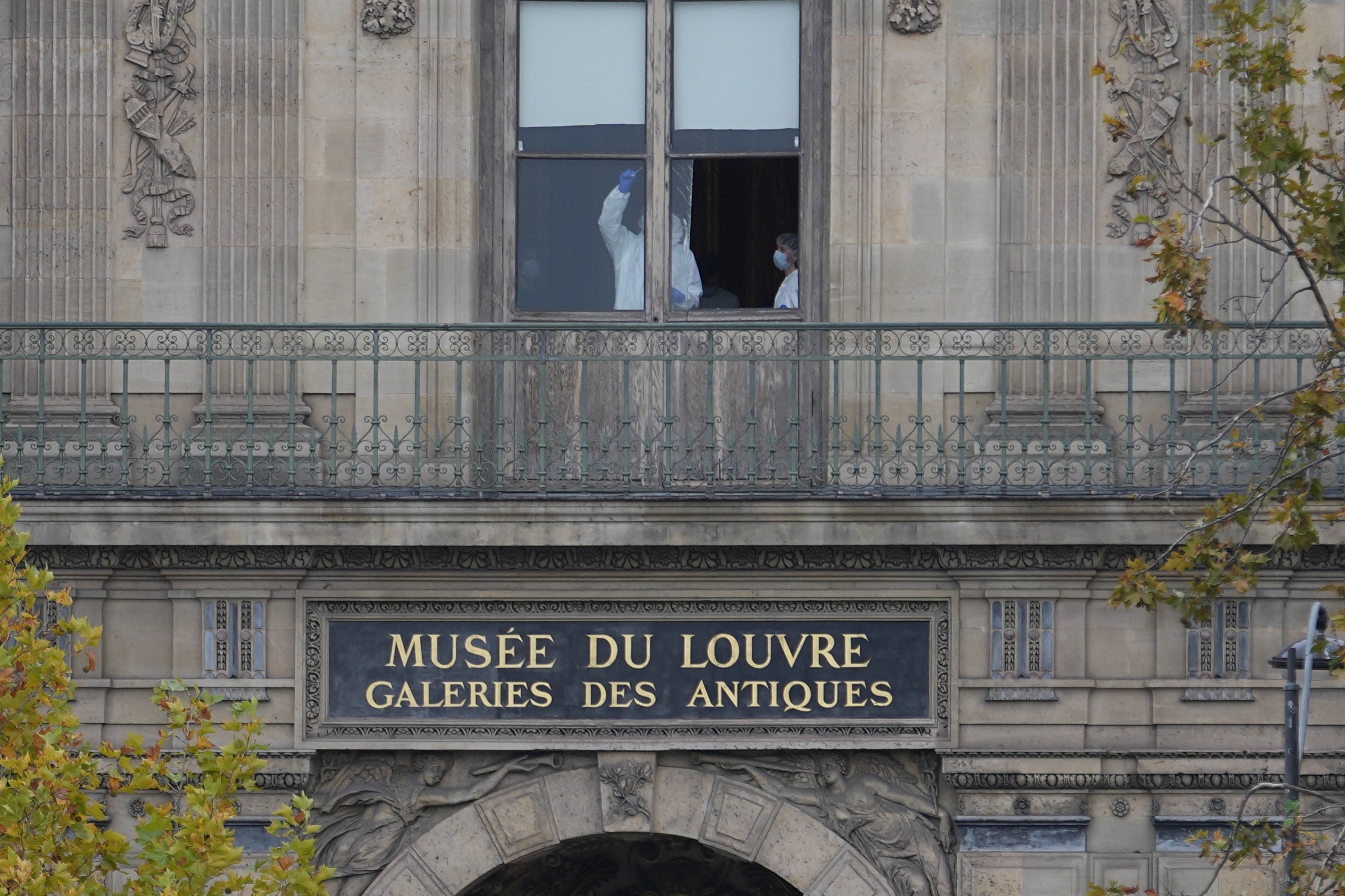 <p>Police officers inside the Louvre museum on Sunday</p>