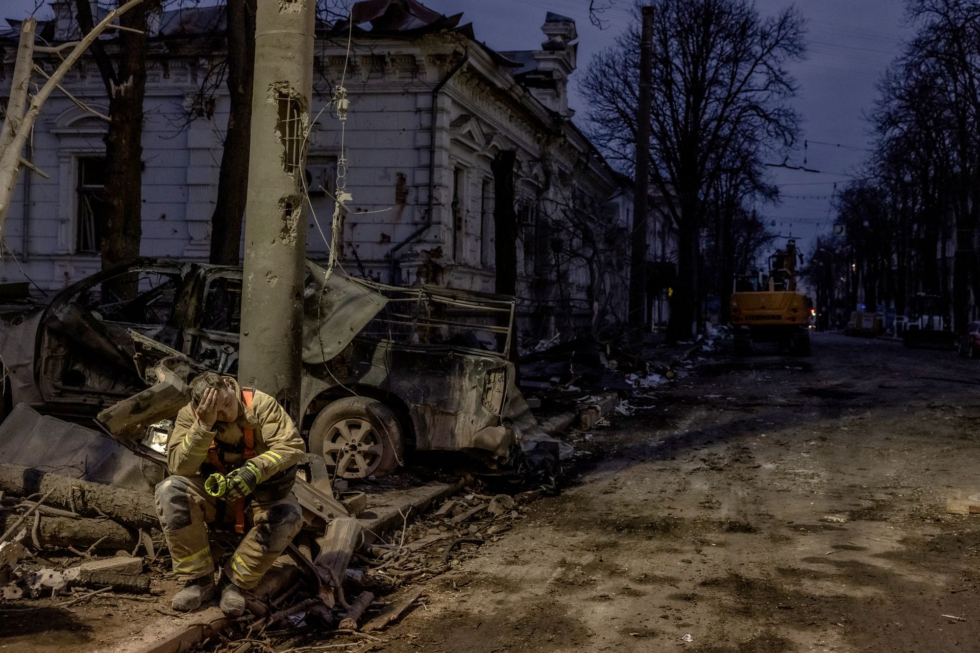 A rescuer takes a break at the site of a missile attack in Sumy, northeastern Ukraine, in April this year. Two ballistic missiles hit the centre of the city, killing at least 34 people