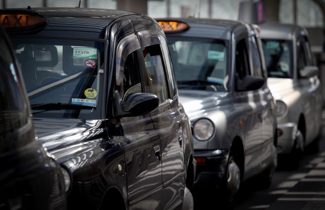 <p>The black cab drivers are seeking around £15,000 each in damages (Lauren Hurley/PA)</p>
