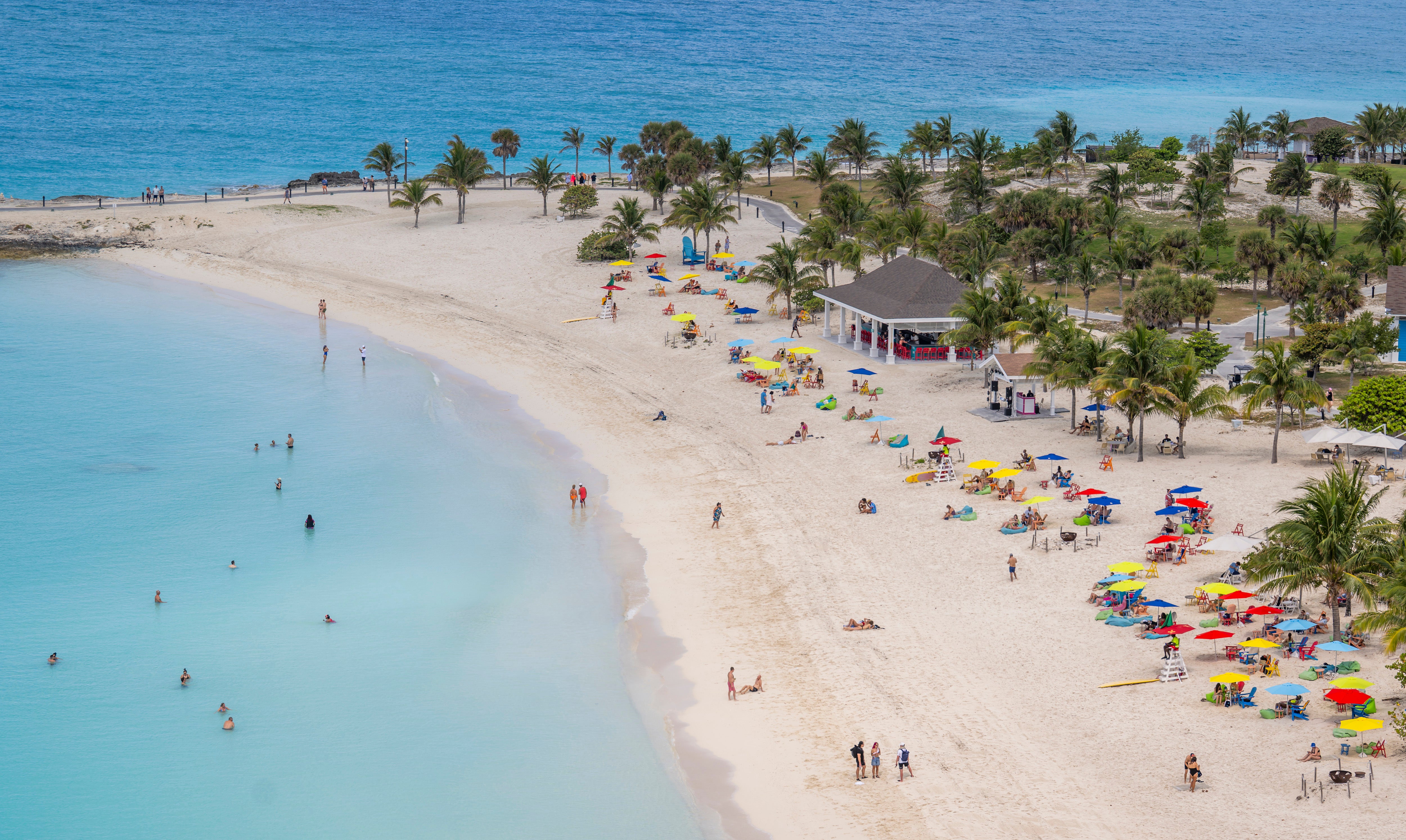 <p>Eight Americans were among those arrested in the Bahamas after 'high-powered weapons' and cash were found on their boat, according to the authorities</p>