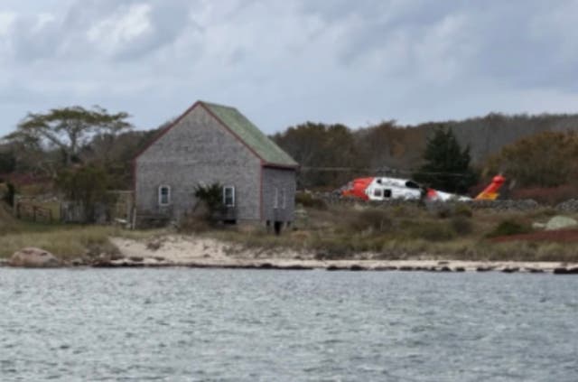 <p>A family was rescued after being stranded on a remote Massachusetts island for a little over a day after their boat caught fire</p>