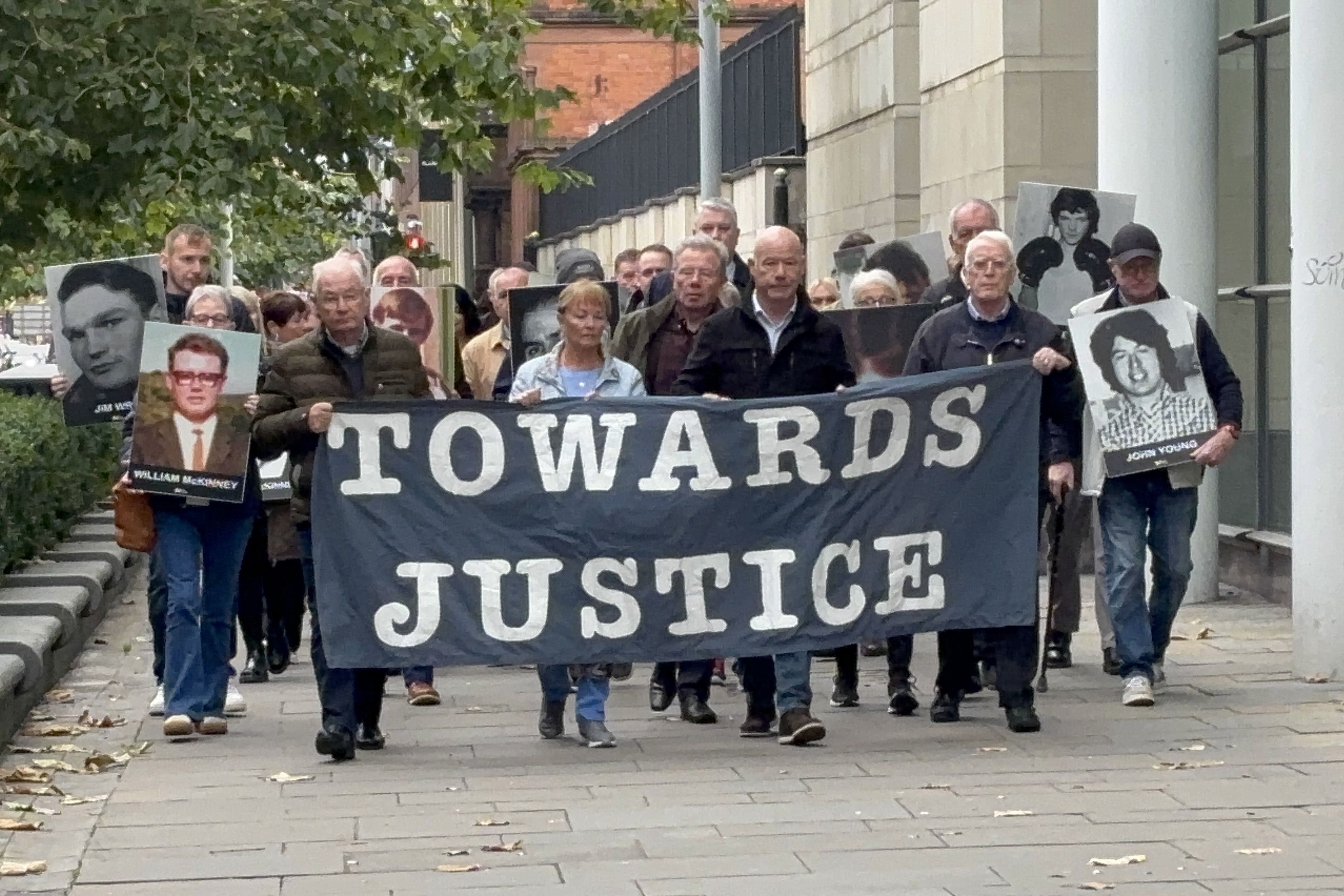 <p>Families of James Wray and William McKinney, who were shot dead during the events of Bloody Sunday, arrive at Belfast Crown Court</p>