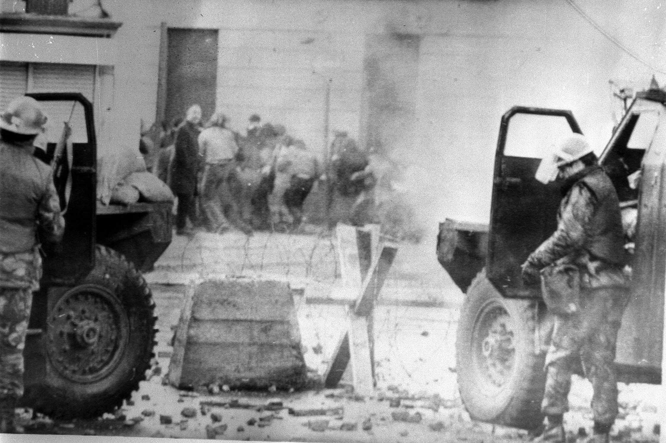 Soldiers taking cover behind their sandbagged armoured cars on Bloody Sunday (PA)