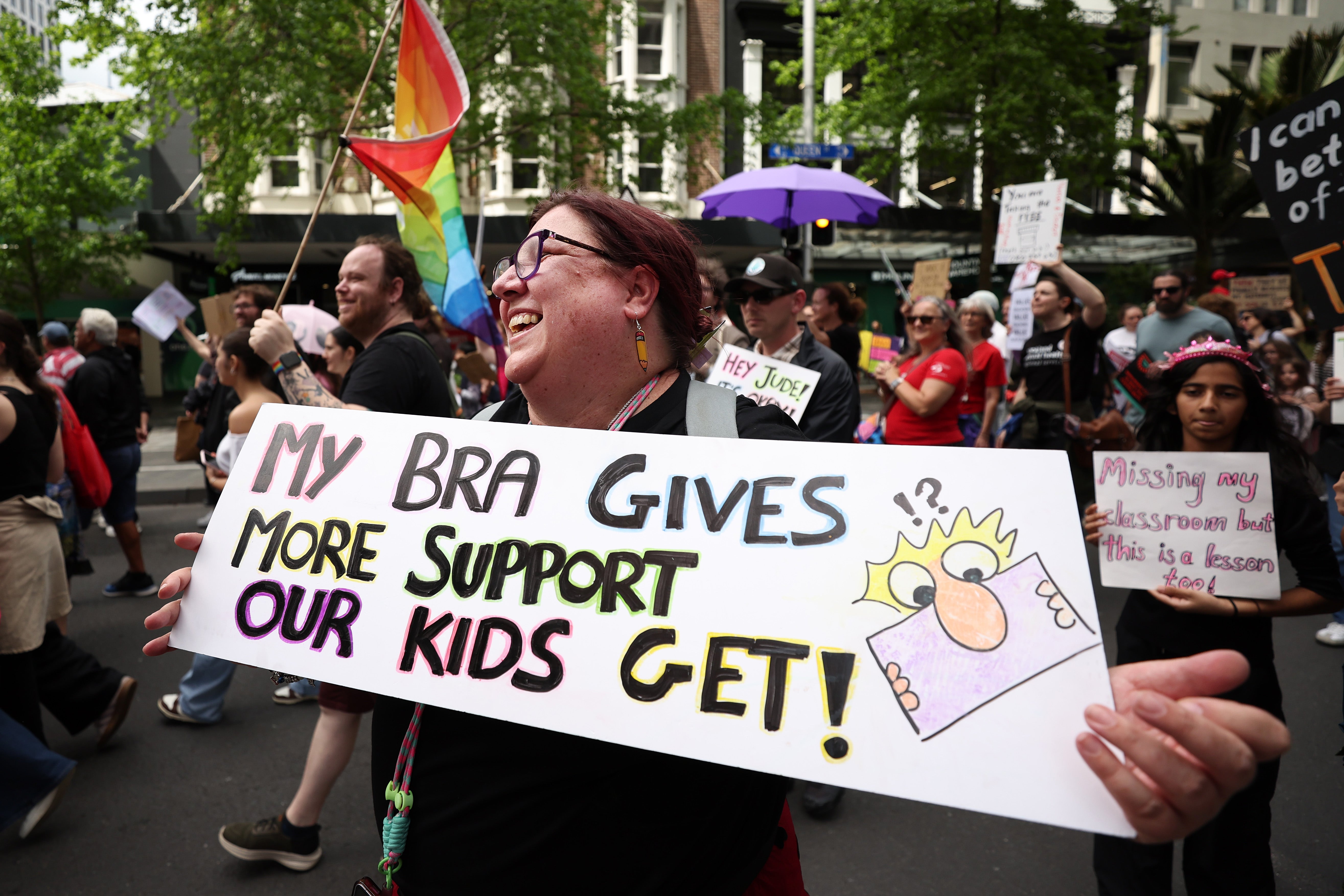 Education and healthcare workers march down Auckland’s Queen Street on 23 October as part of a ‘mega strike’