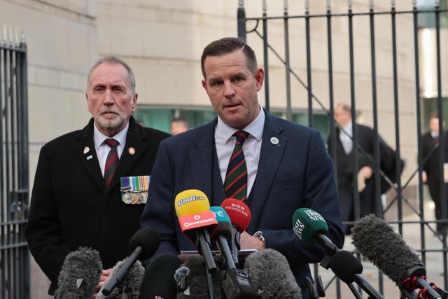 Paul Young, left, and David Johnstone speak to the media outside Belfast Crown Court (Liam McBurney/PA)