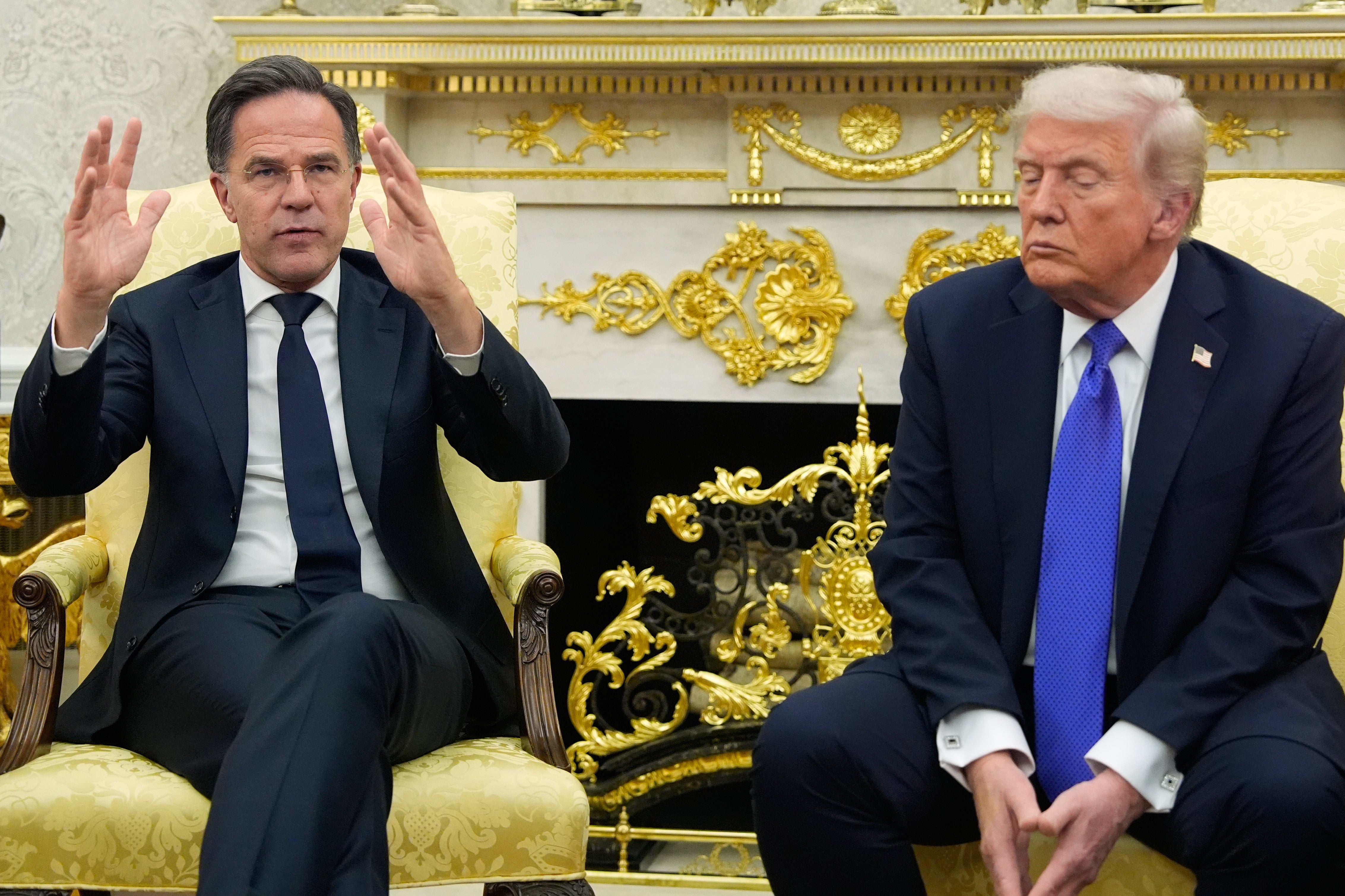 Nato secretary general Mark Rutte (left) has been careful to shower Trump with praise