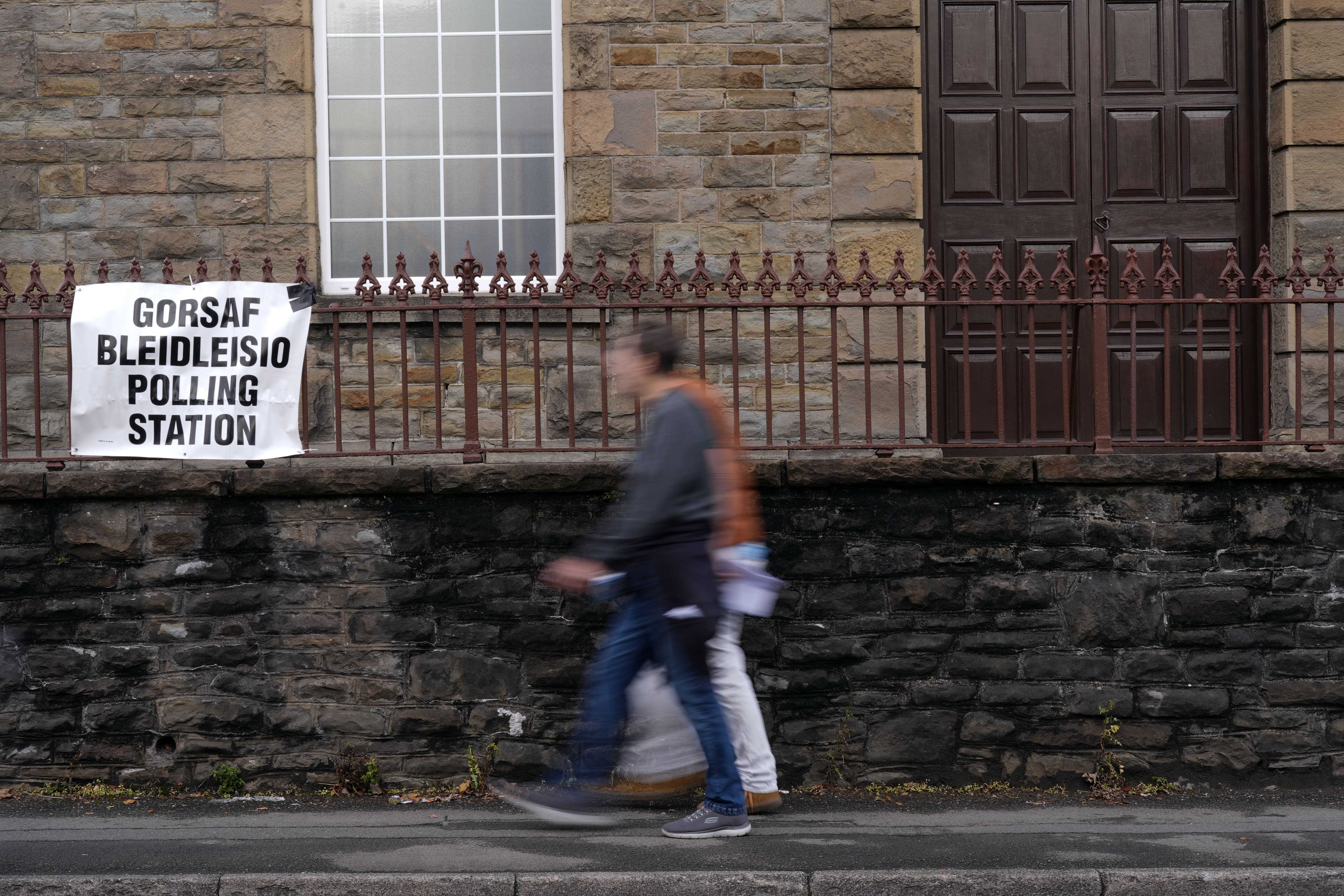 Voters in Wales and Scotland who cannot make it to a polling station must use a paper form if they want a postal or proxy ballot (Andrew Matthews/PA)