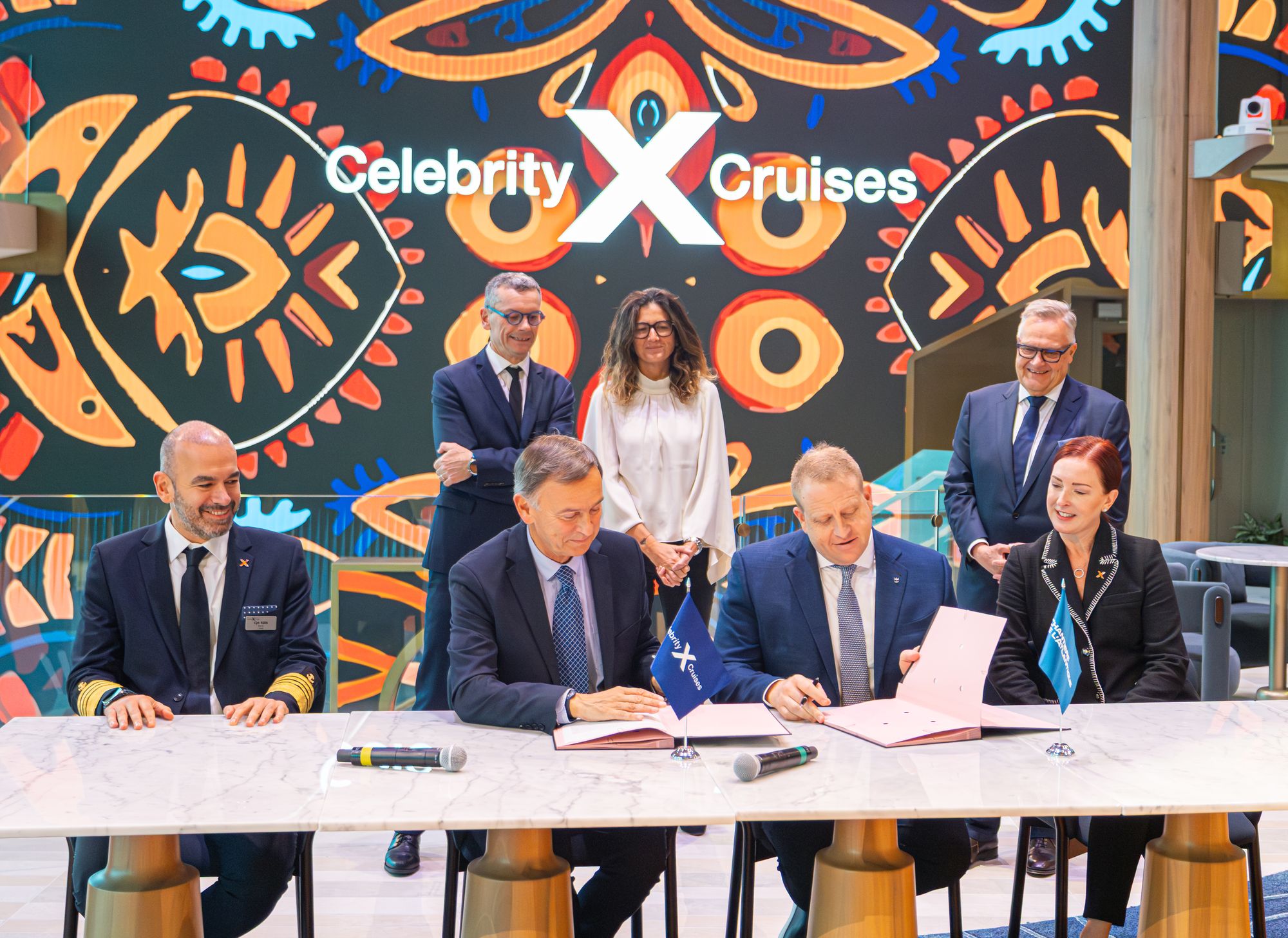 Royal Caribbean Group president and chief executive Jason Liberty, Laura Hodges Bethge, president of Celebrity Cruises and captain Kyriakos Matragkas take delivery of Celebrity Xcel