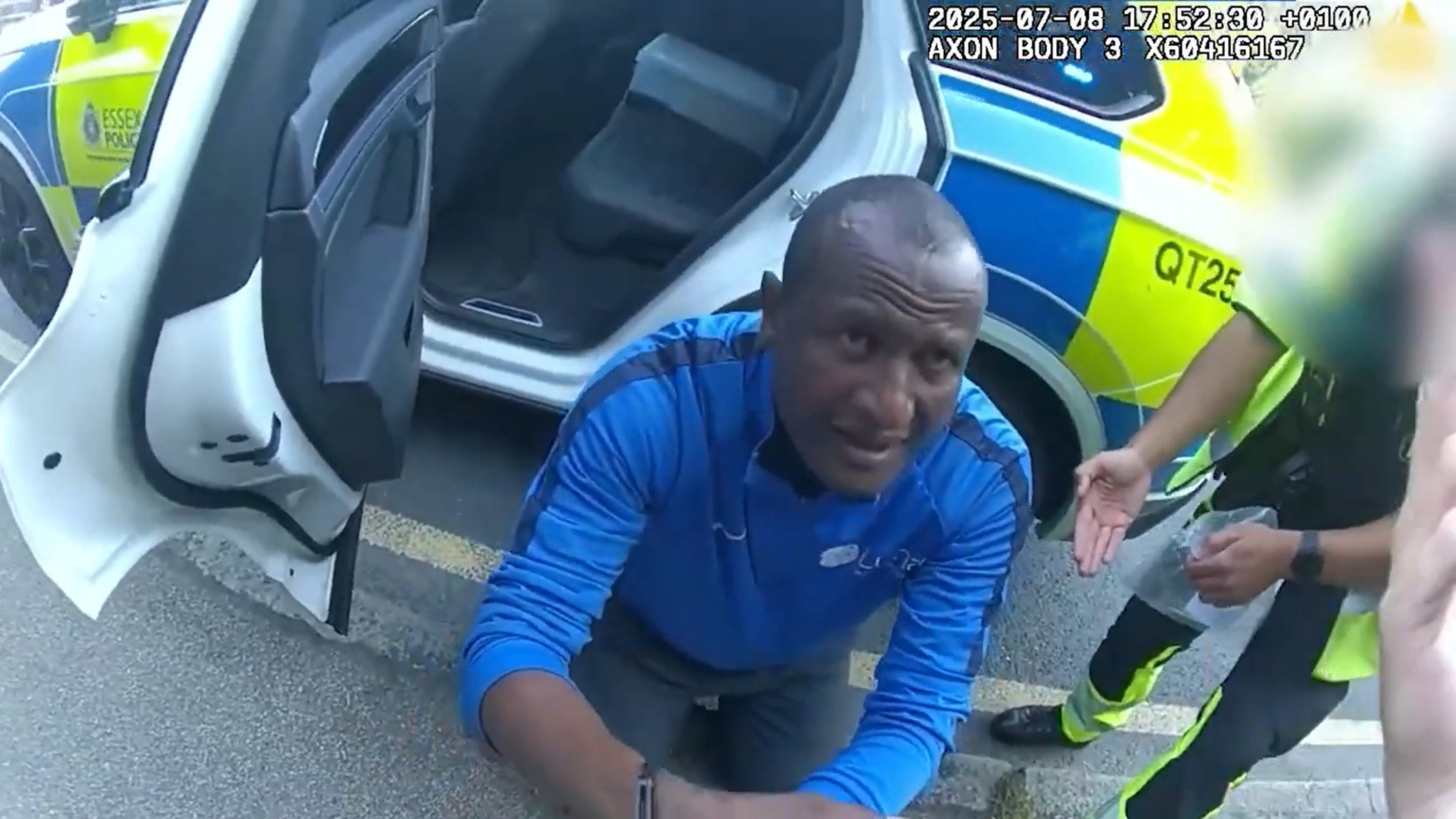 <p>Screengrab taken from body-worn video showing the arrest of Hadush Gerberslasie Kebatu (CPS/PA)</p>