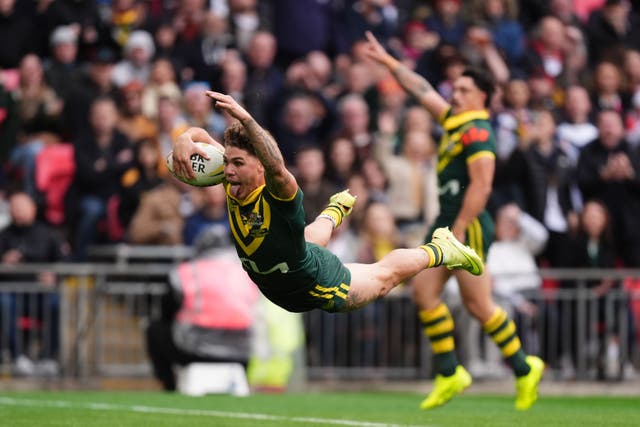 Australia’s Reece Walsh scores the first of their four tries in a 26-6 win over England at Wembley (Mike Egerton/PA).