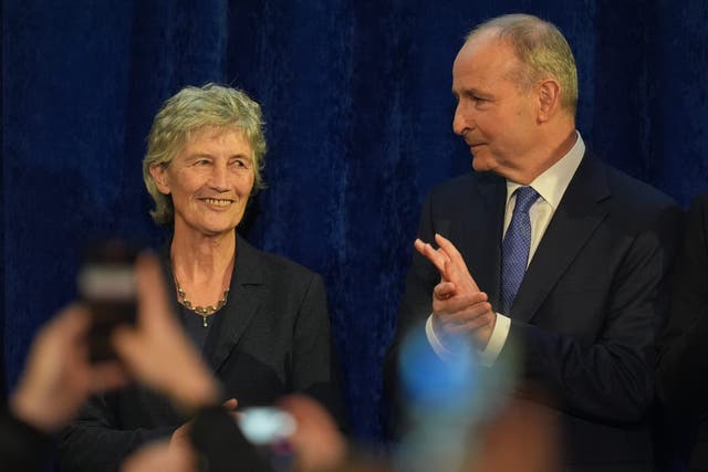 Independent candidate Catherine Connolly is congratulated by Taoiseach Micheal Martin after being named as the new president of Ireland (PA)