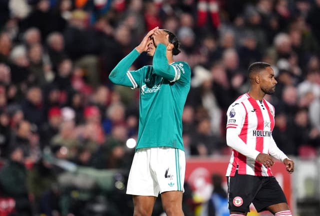 <p>Liverpool’s Virgil van Dijk reacts after a fourth consecutive defeat</p>