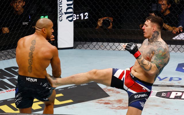 <p>Tom Aspinall (right) could not continue after being poked in both eyes by Ciryl Gane</p>