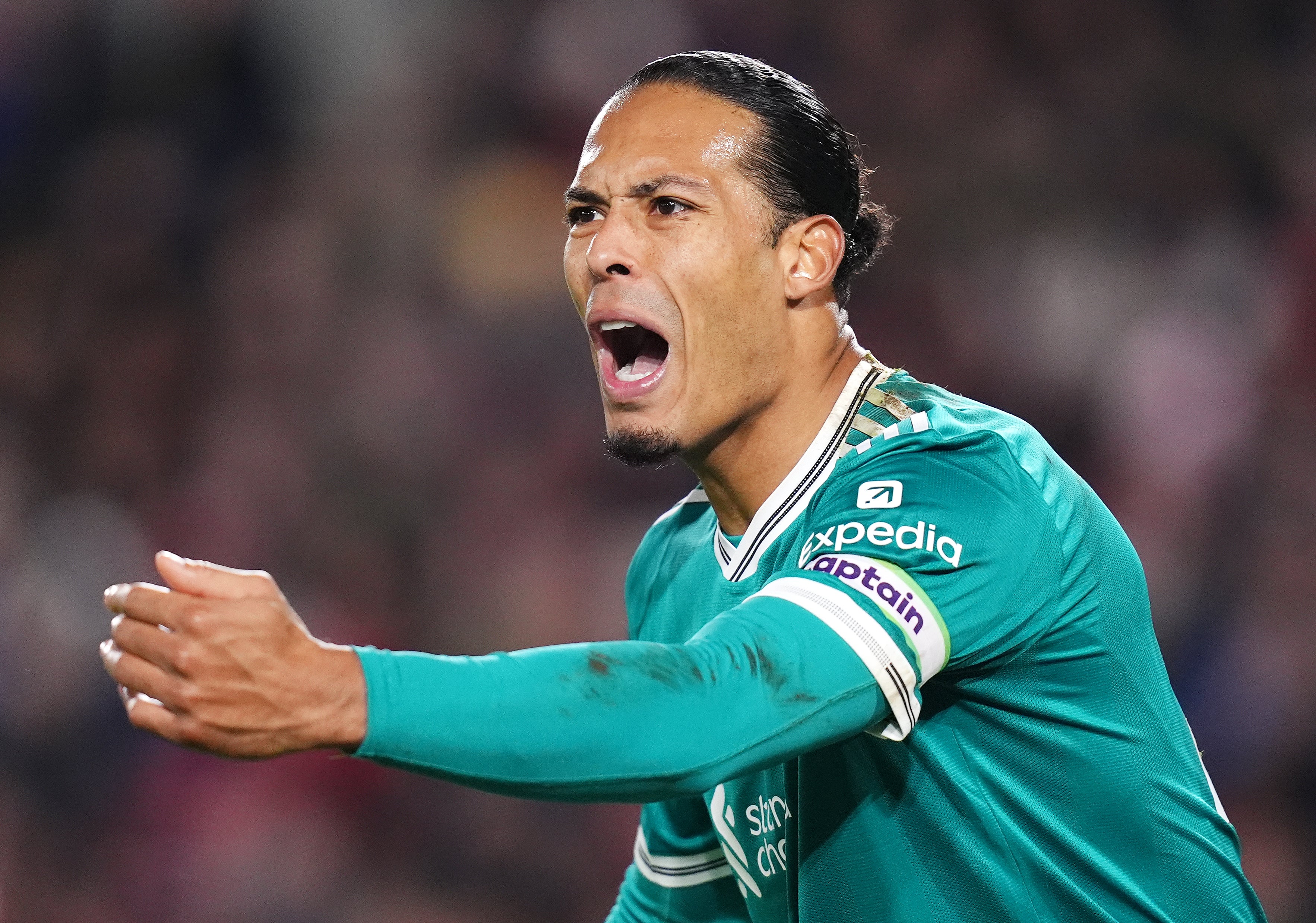 <p>Liverpool’s Virgil van Dijk barks out orders (John Walton/PA)</p>