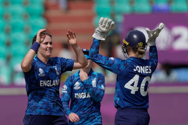 England captain Nat Sciver-Brunt celebrates with Amy Jones after taking the wicket of New Zealand batter Rosemary Mair during their World Cup victory in India (Mahesh Kumar AP)