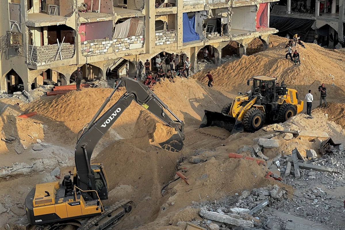 Excavators enter Gaza as Egypt and Red Cross widen search for bodies of hostages