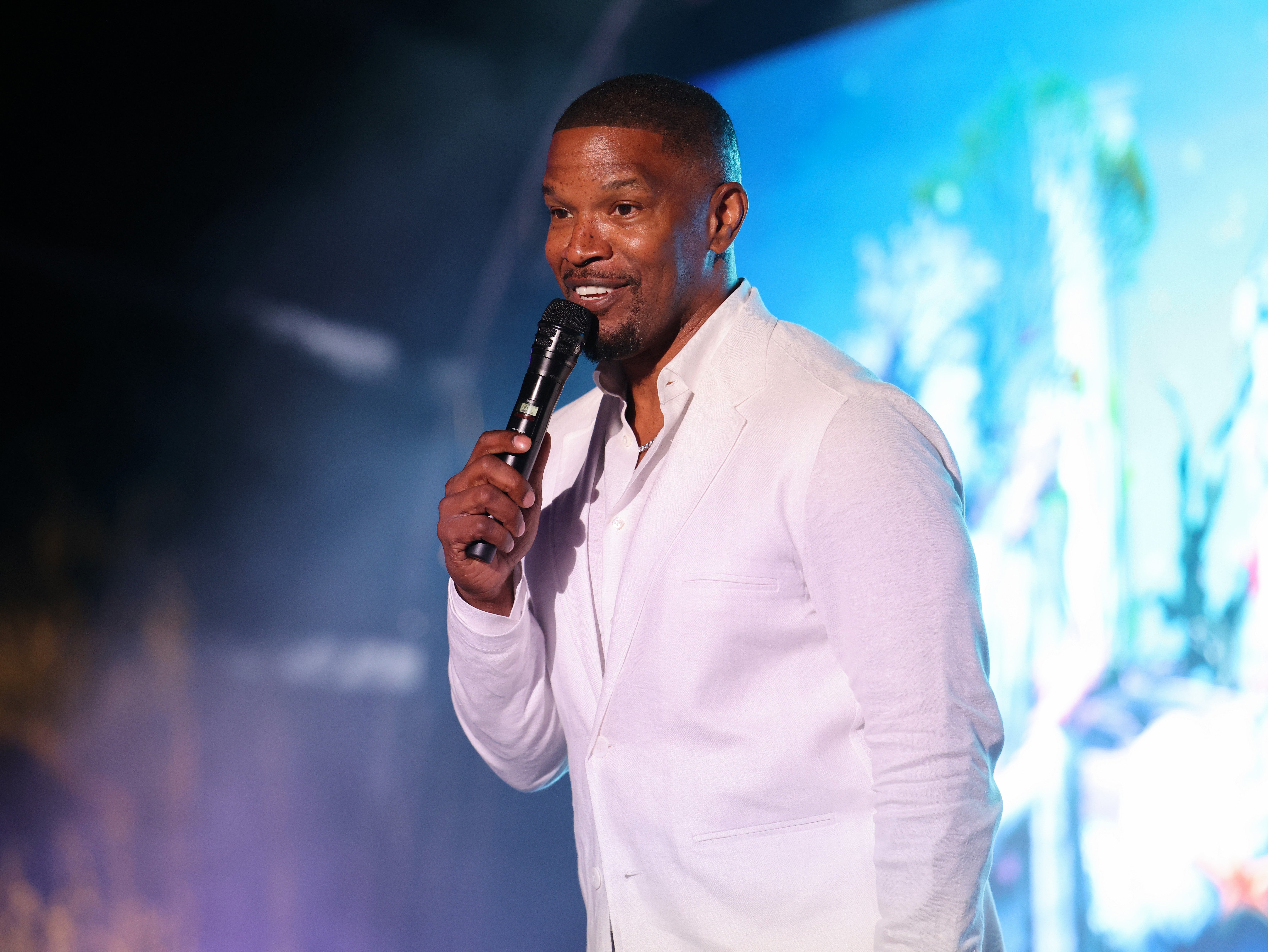 <p>Jamie Foxx took the microphone to yell at a Halloween party guest who apparently threw a bottle at GloRilla </p>