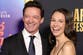 Hugh Jackman and Sutton Foster make red carpet debut nearly a year after going public with secret romance