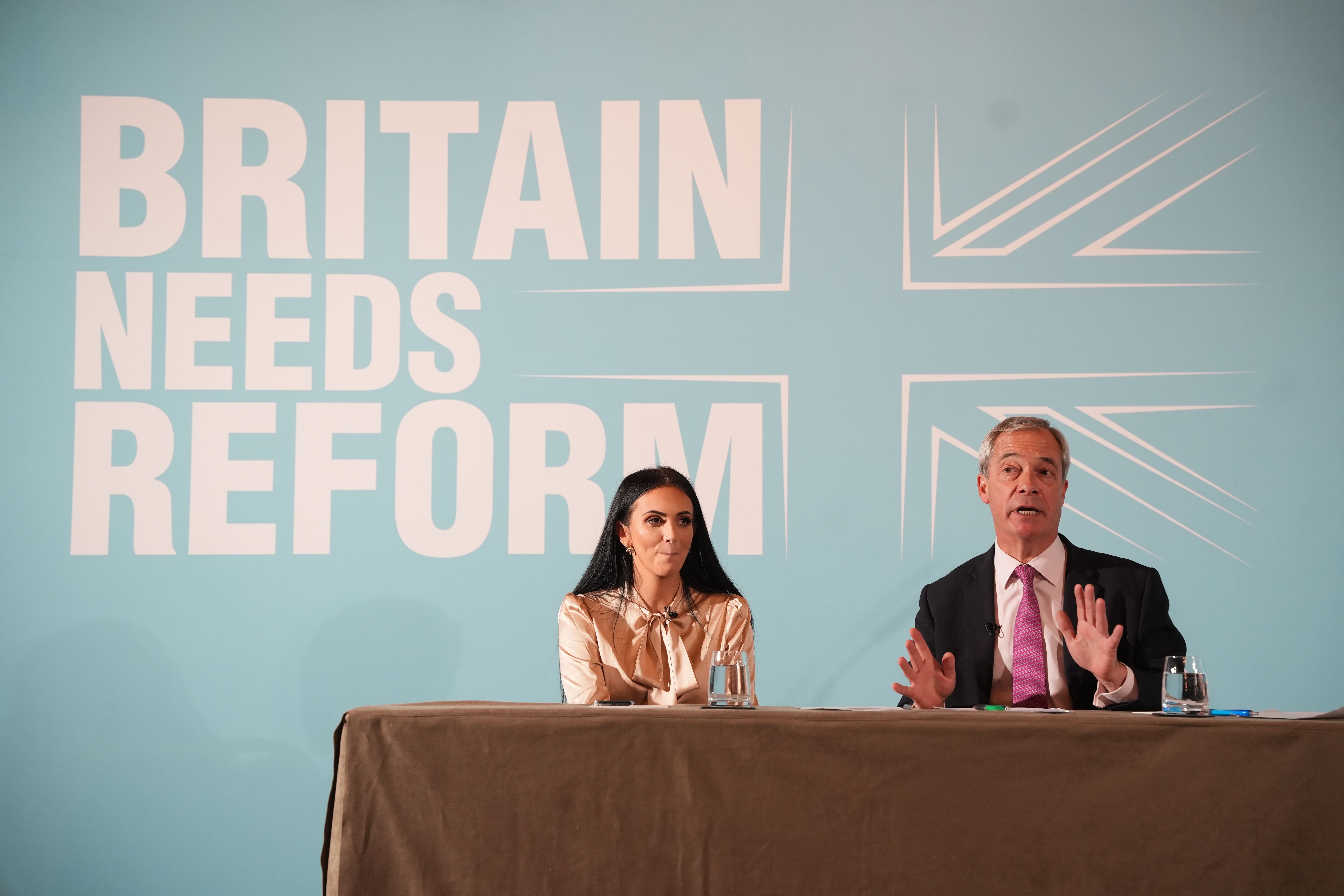 Reform UK leader Nigel Farage (right) and grooming gangs survivor Ellie-Ann Reynolds during a press conference at the Royal Horseguards hotel, in Westminster, London (Jeff Moore/PA)