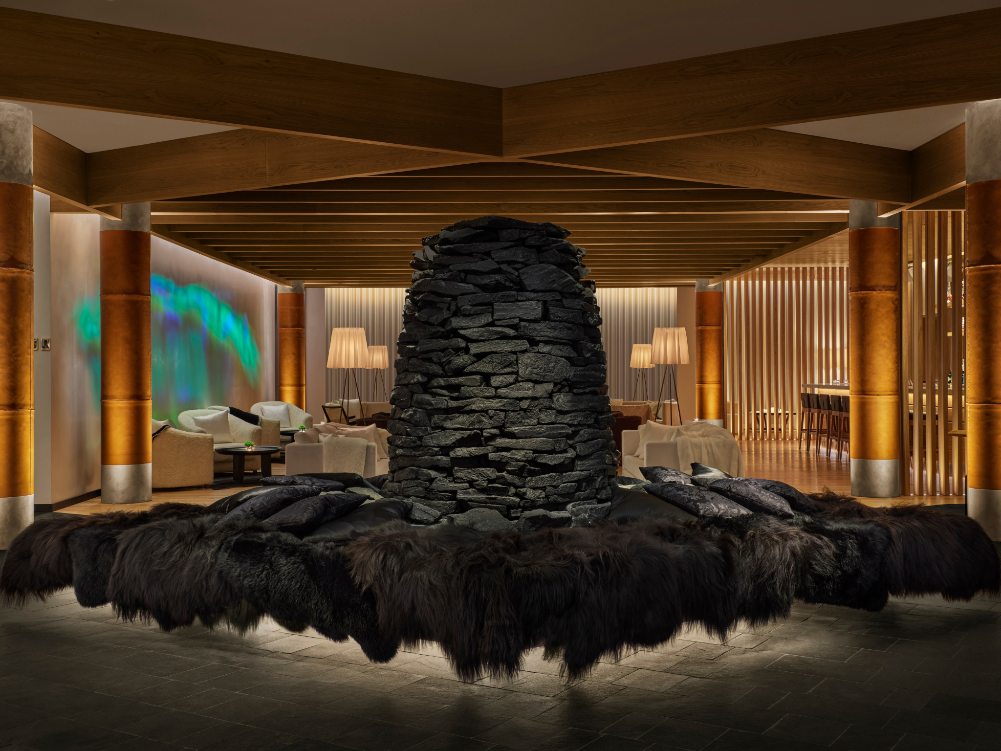 The foyer sets the tone with shaggy Icelandic sheepskins, a roaring fire and projections of the Northern Lights