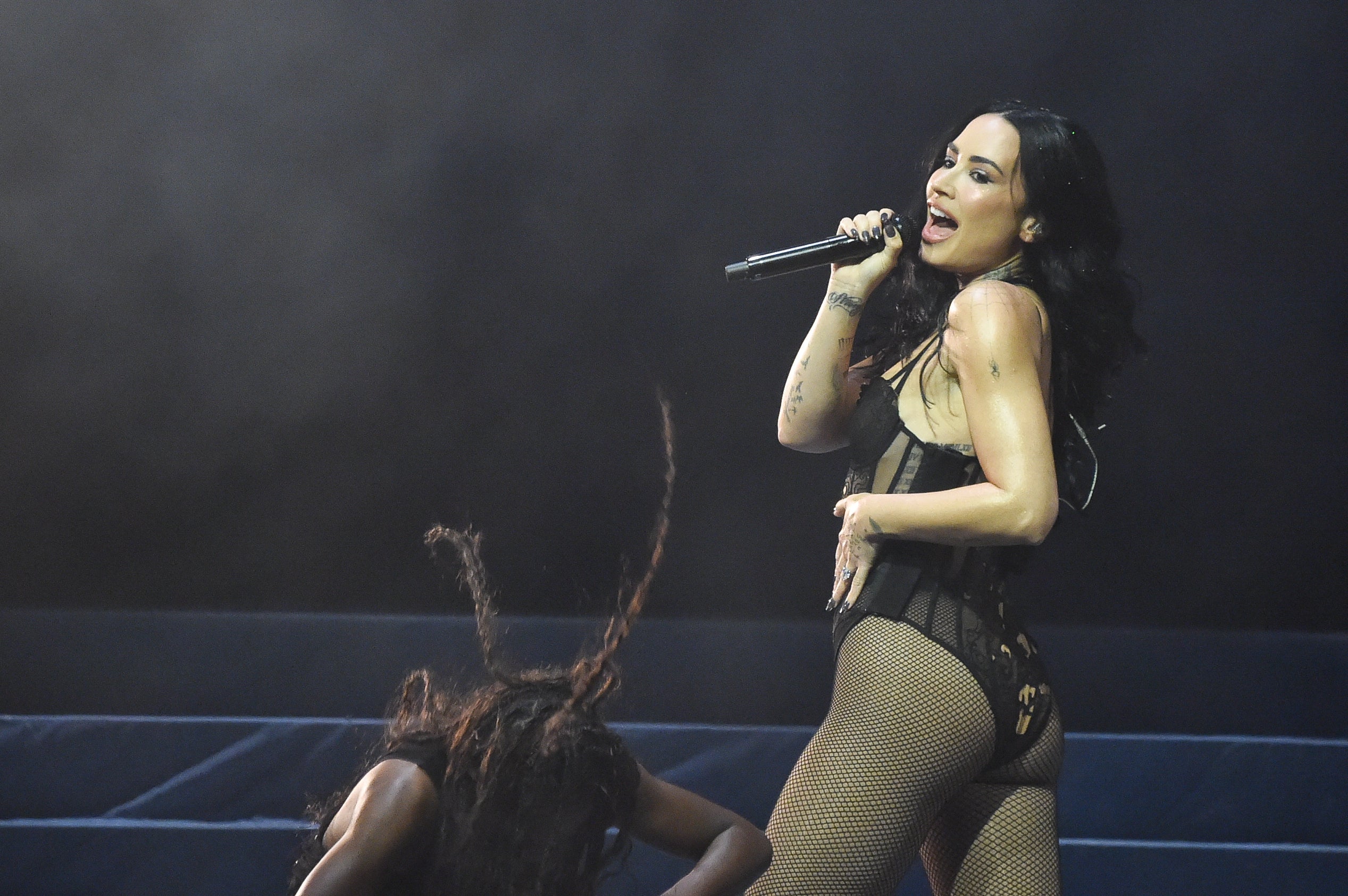 <p>Demi Lovato on stage</p>