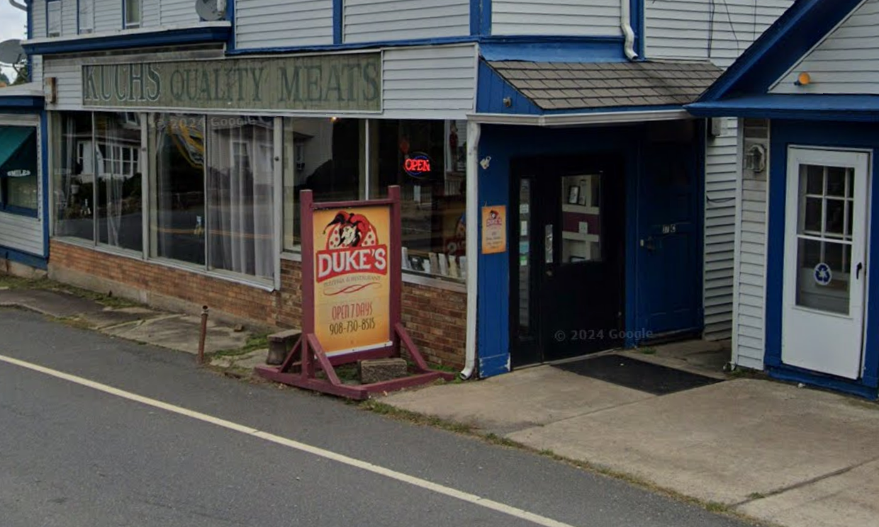 <p>Duke’s Pizzeria in Pittstown, New Jersey. A New Jersey cop is facing misconduct charges after allegedly ignoring reports of gunshots that left two people dead, and going for pizza instead</p>