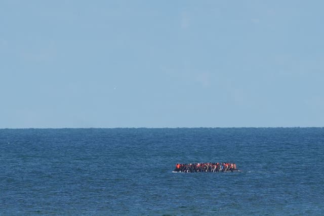 <p>A group of people believed to be migrants on board a small boat attempt to cross the Channel (file image)</p>