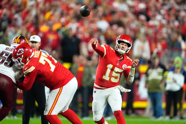 Kansas City Chiefs quarterback Patrick Mahomes (15) throws during the first half of an NFL football game against the Washington Commanders (Charlie Riedel/AP)