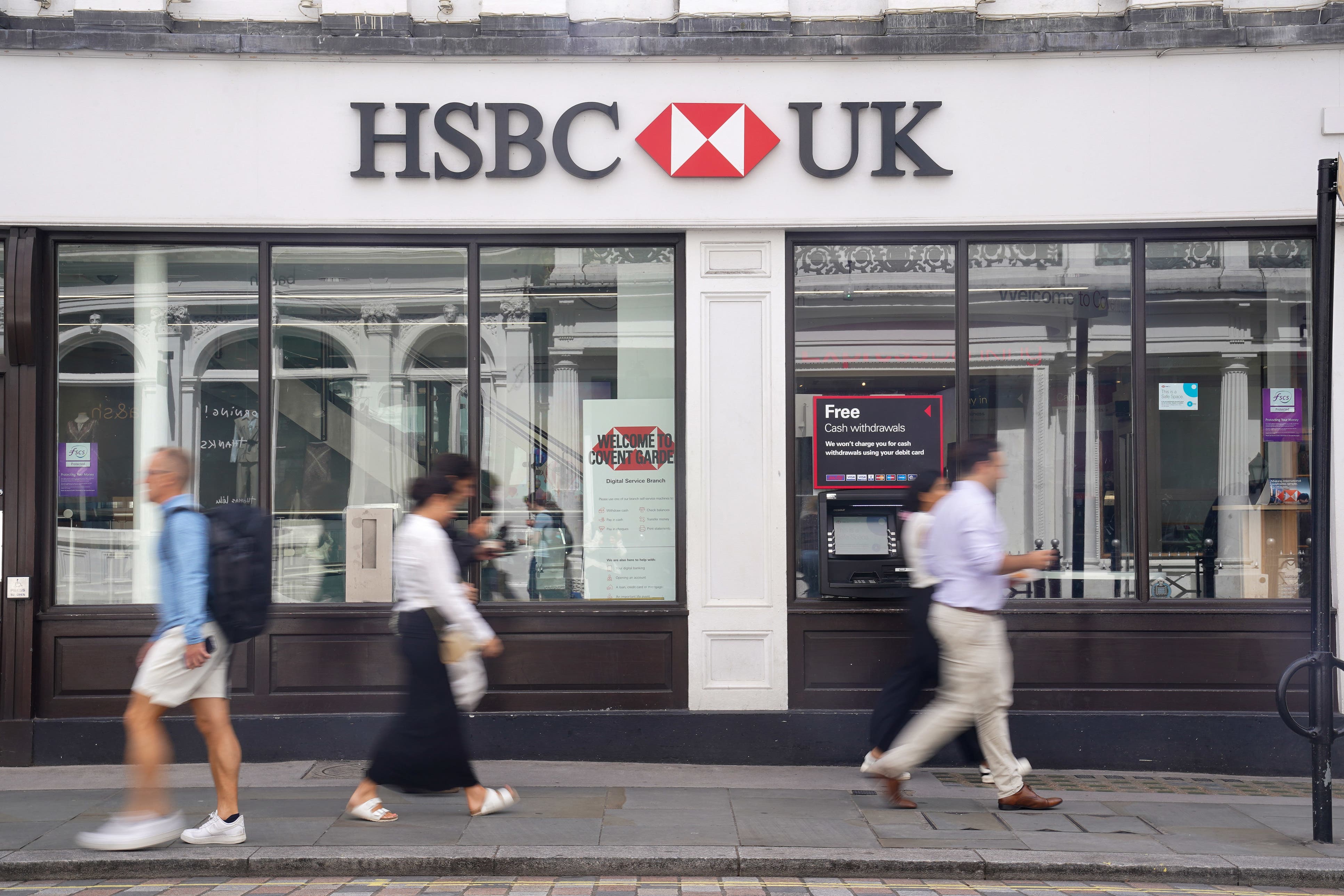 People walk past an HSBC bank in Covent Garden, London (PA)