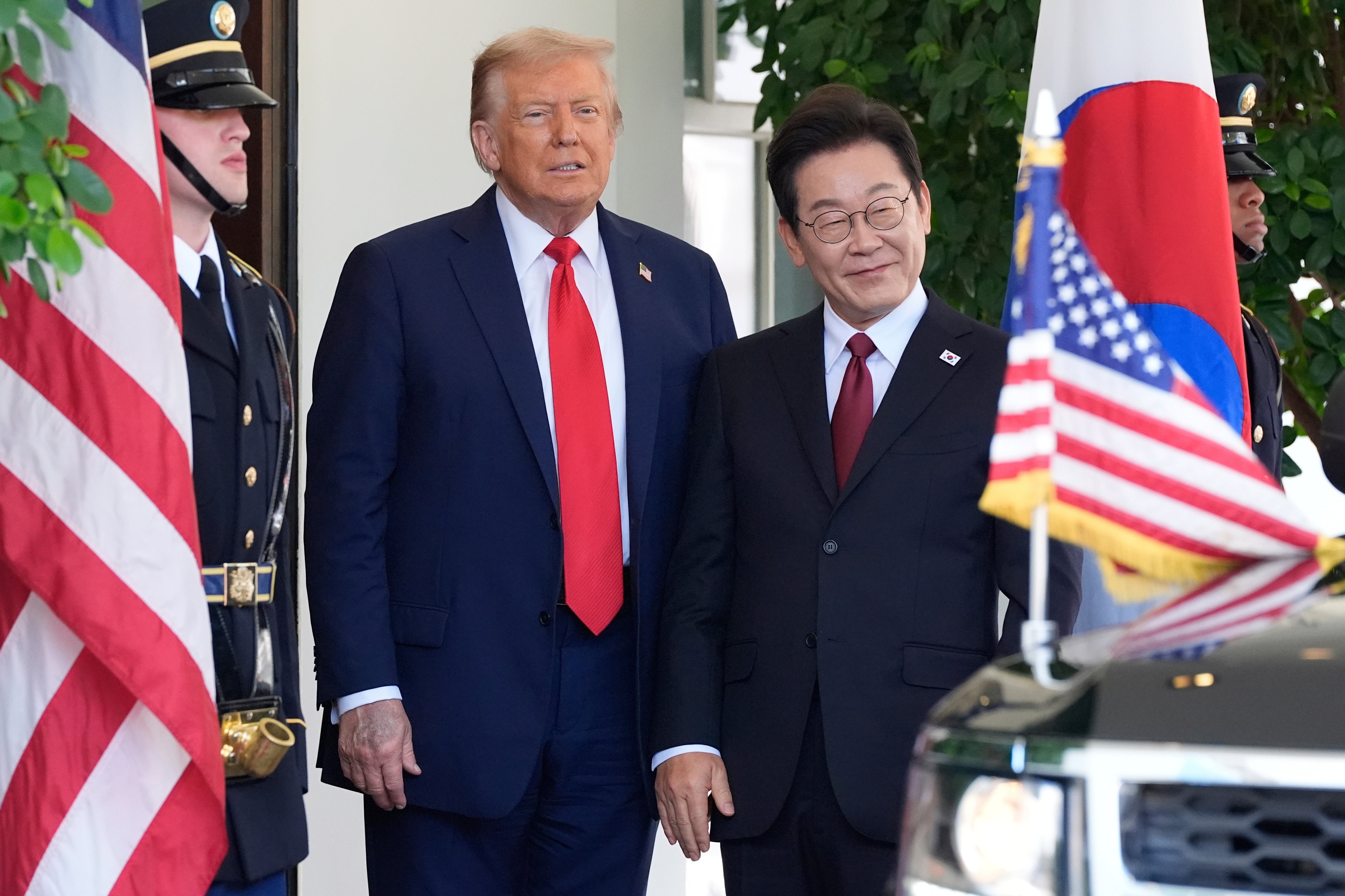 <p>President Donald Trump greets South Korean President Lee Jae Myung at the White House in the summer</p>