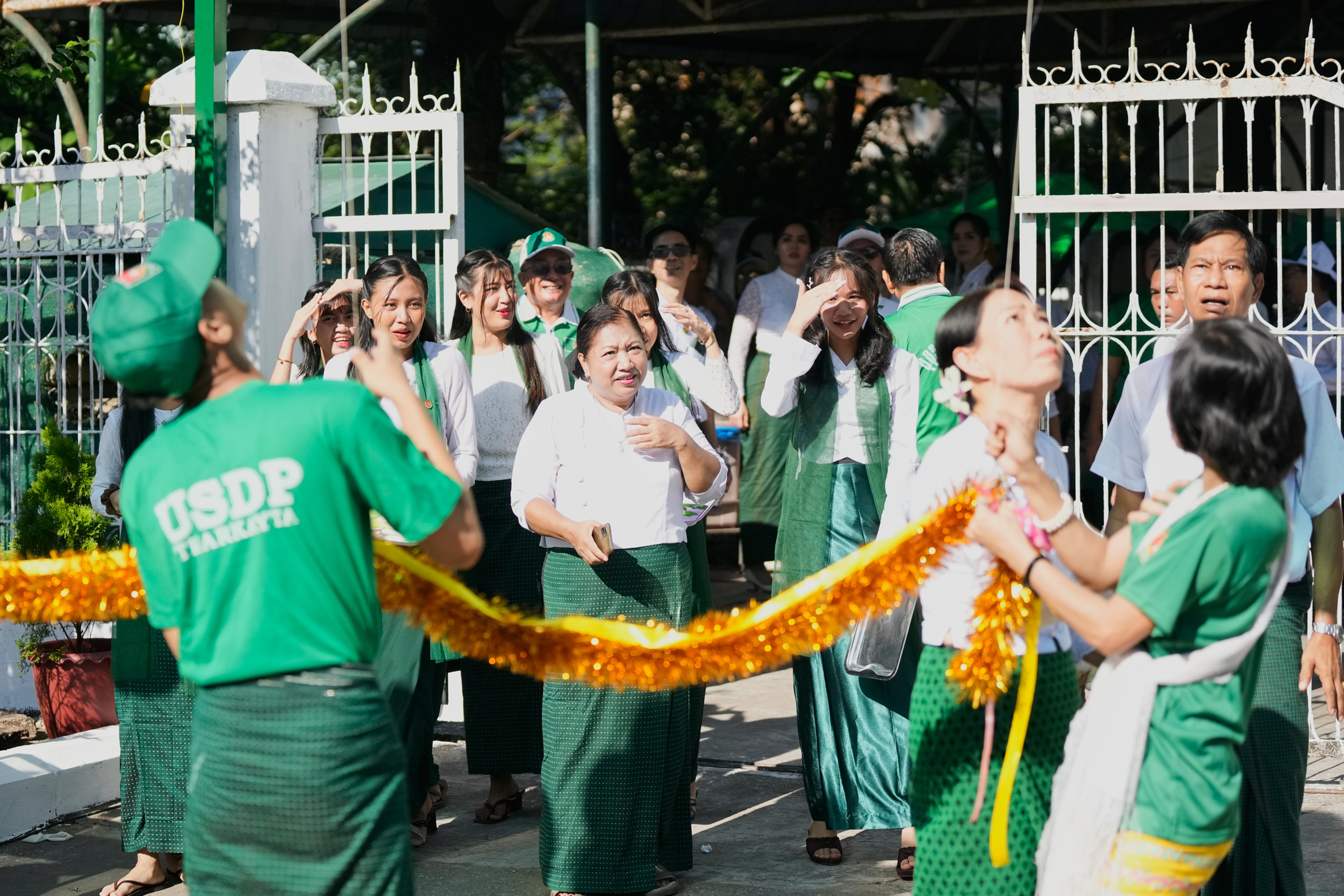 Members of the Union Solidarity and Development Party, which is backed by the junta, gather for an event on the first day of the election campaign in Yangon, Myanmar, on 28 October 2025