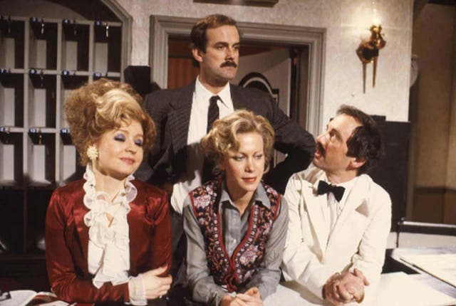 <p>Prunella Scales with the rest of the Fawlty Towers cast, John Cleese, Connie Booth, centre, and Andrew Sachs (BBC/PA)</p>