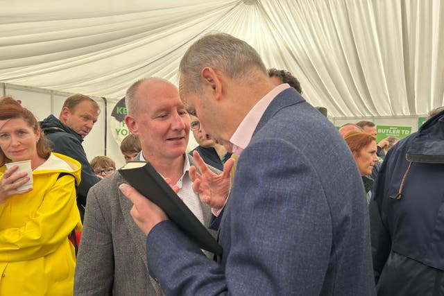 Taoiseach Micheal Martin (right) and then presidential candidate Jim Gavin (left), at the National Ploughing Championships at Tullamore, Co Offaly (Cillian Sherlock/PA)