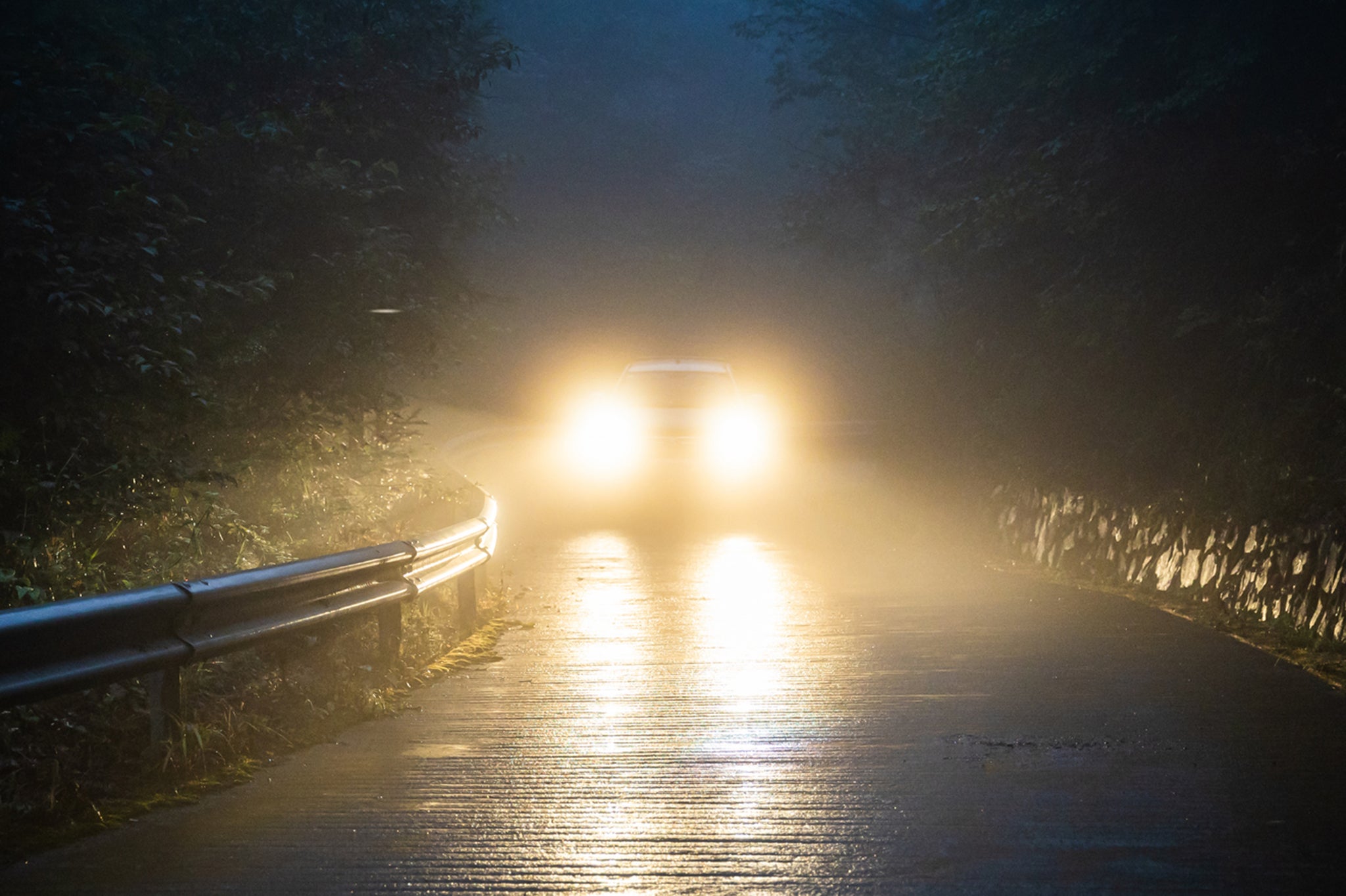 The poll by the RAC highlights the intense brightness of some modern headlights as the primary cause of anxiety for those driving in the dark