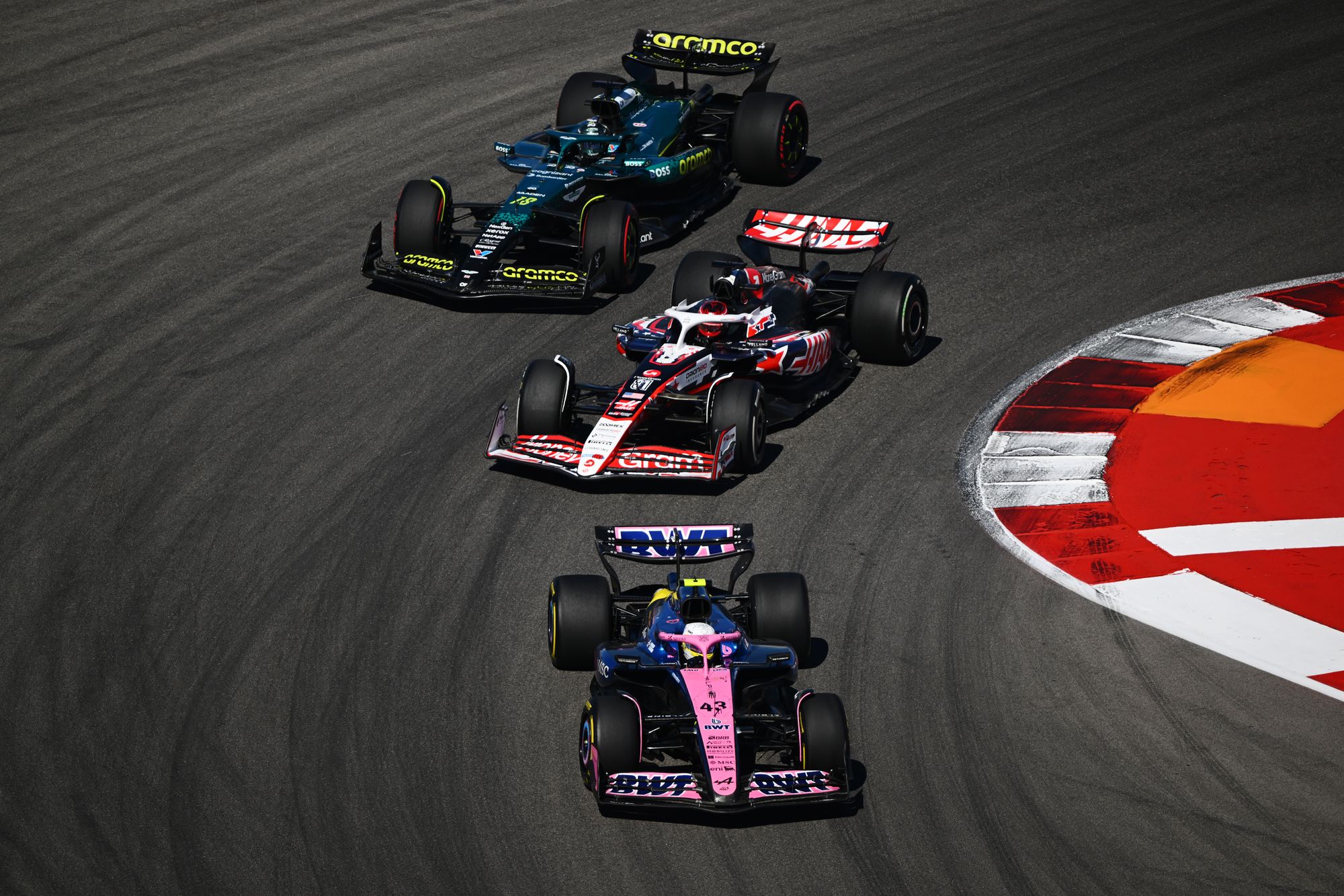 <p>Franco Colapinto of Argentina driving the (43) Alpine F1 A525 Renault leads Esteban Ocon of France driving the (31) Haas F1 VF-25 Ferrari and Lance Stroll of Canada driving the (18) Aston Martin F1 Team</p>