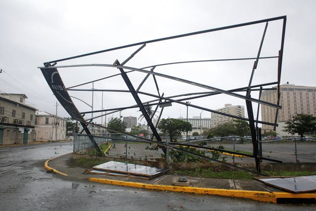 <p>A partially collapsed hoarding frame, as Hurricane Melissa approaches, in downtown Kingston, Jamaica</p>