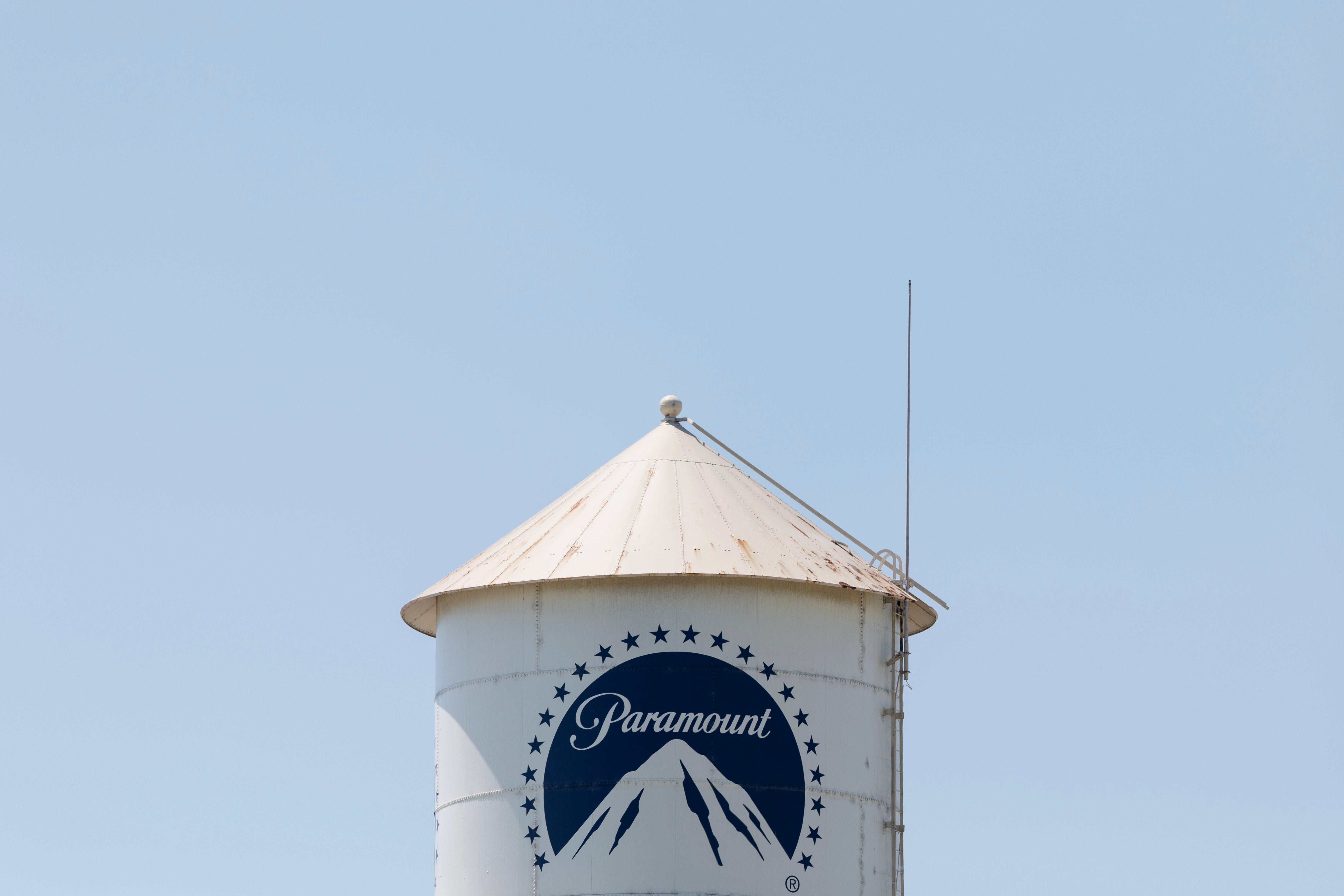 <p>An old, now ceremonial water tower emblazoned with the Paramount logo at the Paramount studios in Los Angeles, California, August 2025</p>