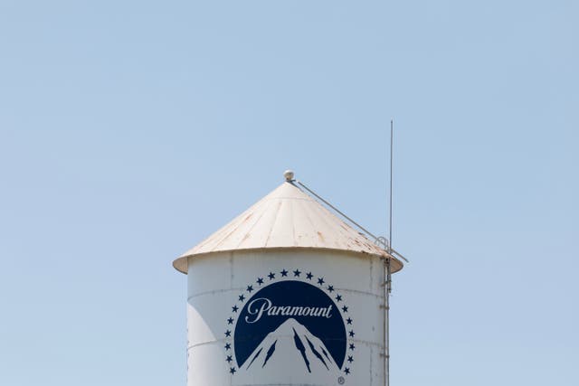 <p>An old, now ceremonial water tower emblazoned with the Paramount logo at the Paramount studios in Los Angeles, California, August 2025</p>