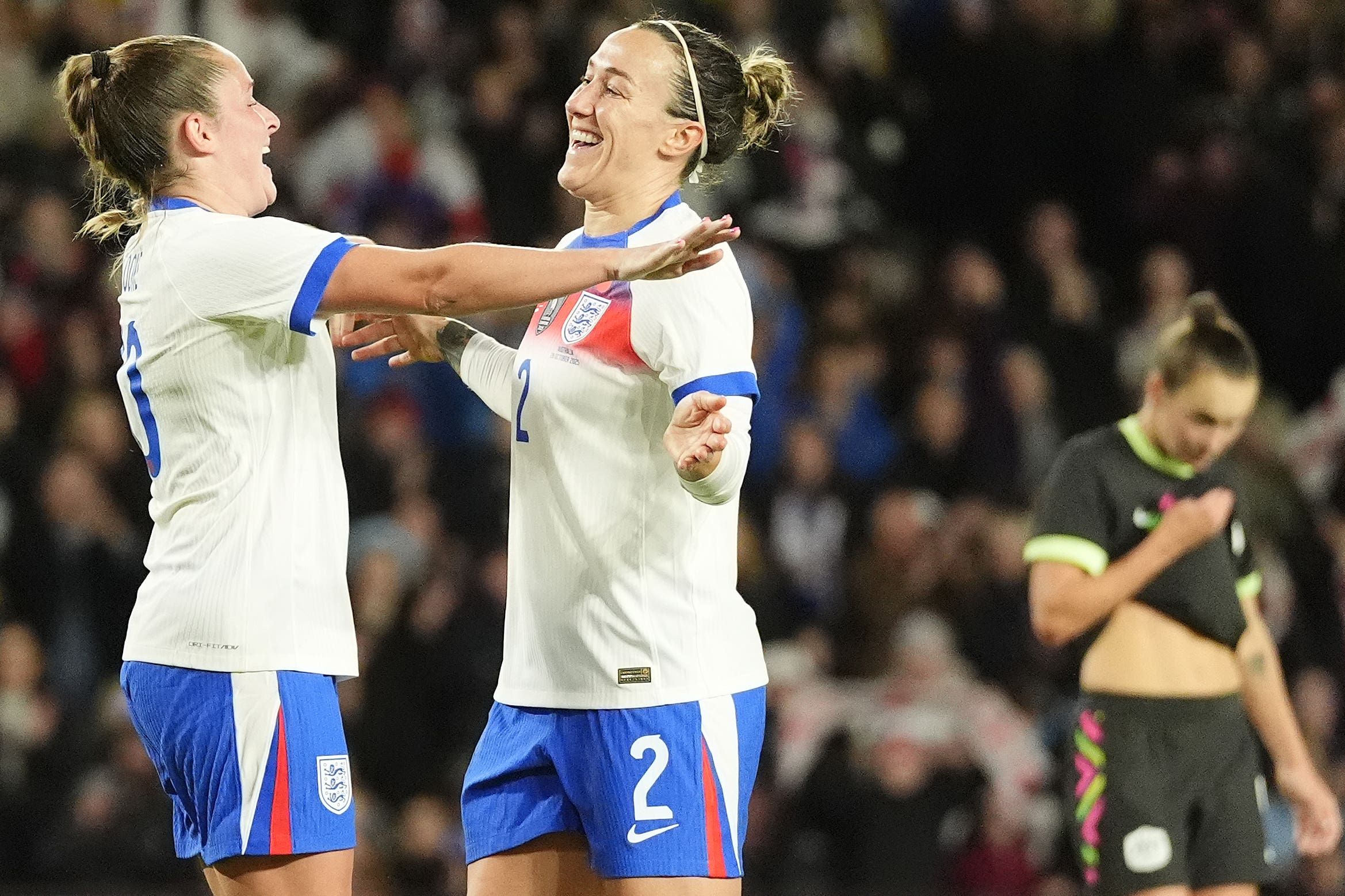 <p>Lucy Bronze celebrates her goal with Ella Toone </p>