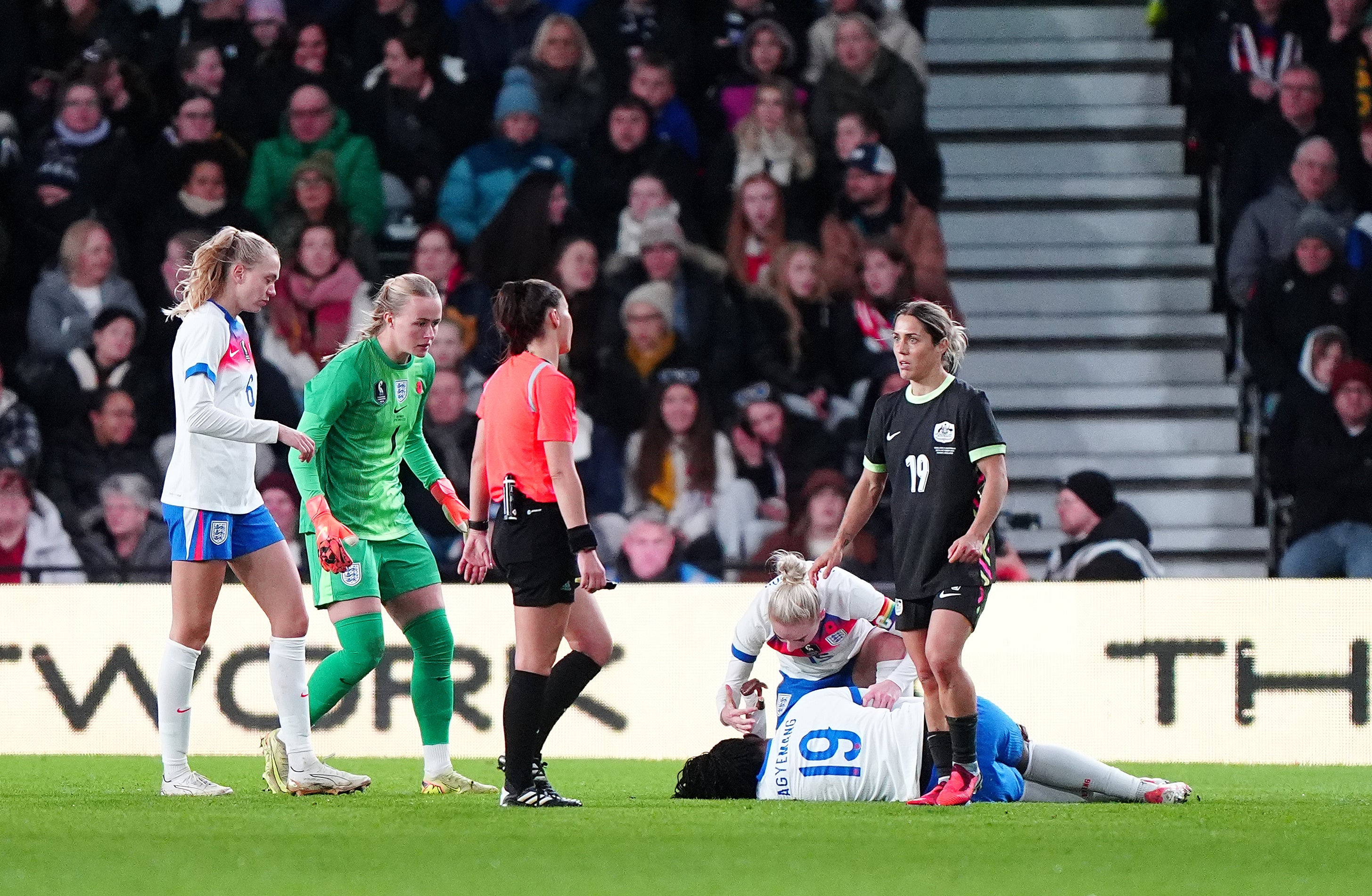 <p>There was concern for Michelle Agyemang as she went down injured against Australia (Bradley Collyer/PA)</p>