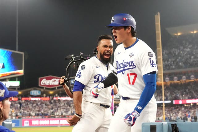 <p>Los Angeles Dodgers two-way player Shohei Ohtani (17) celebrates with right fielder Teoscar Hernandez (37) after a solo home run against the Toronto Blue Jays</p>