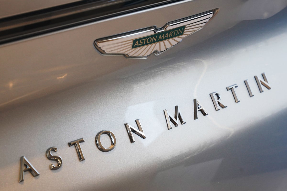 Aston Martin cuts investment plans as sales tumble further