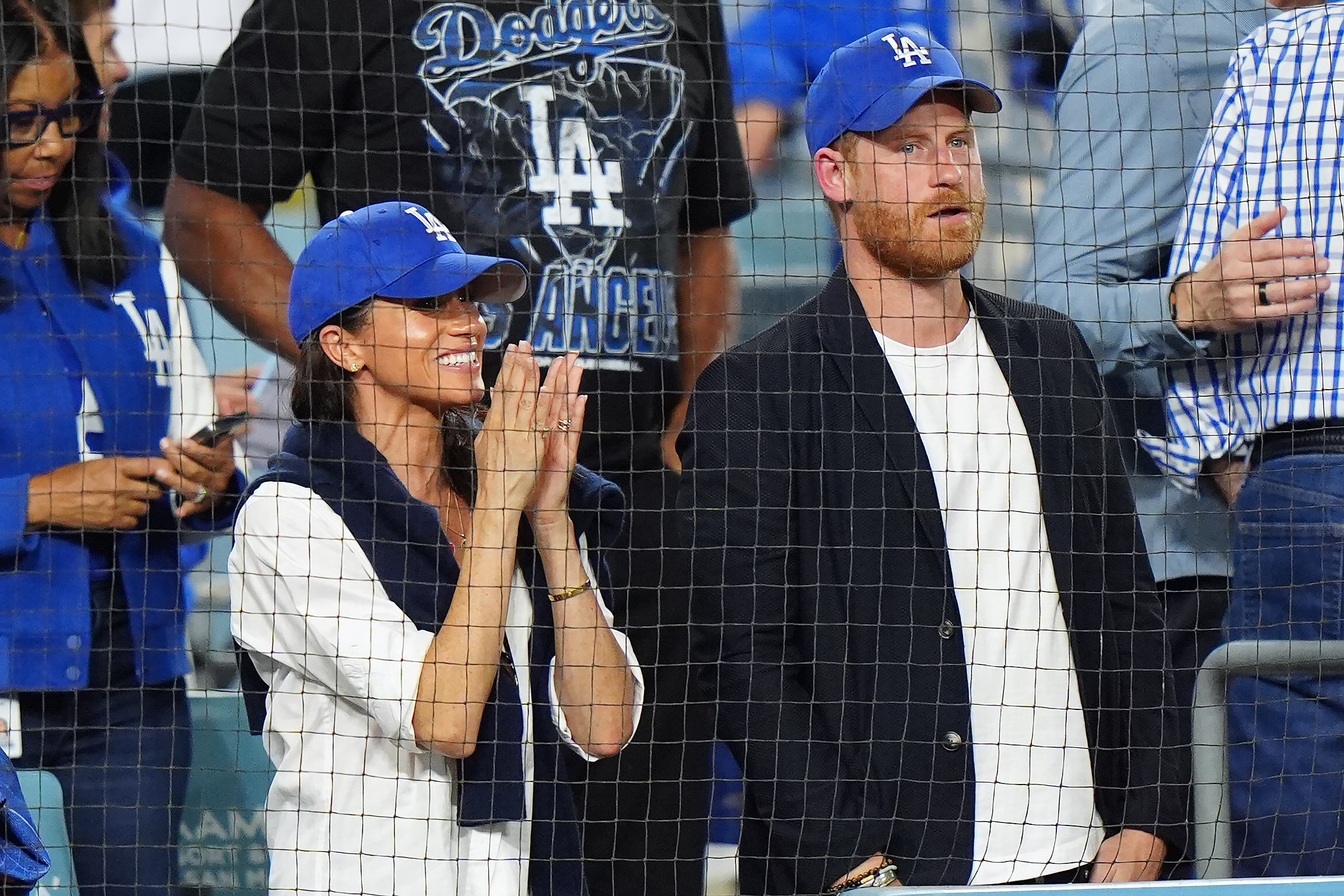 <p>Harry and Meghan watching the LA Dodgers and the Toronto Blue Jays</p>