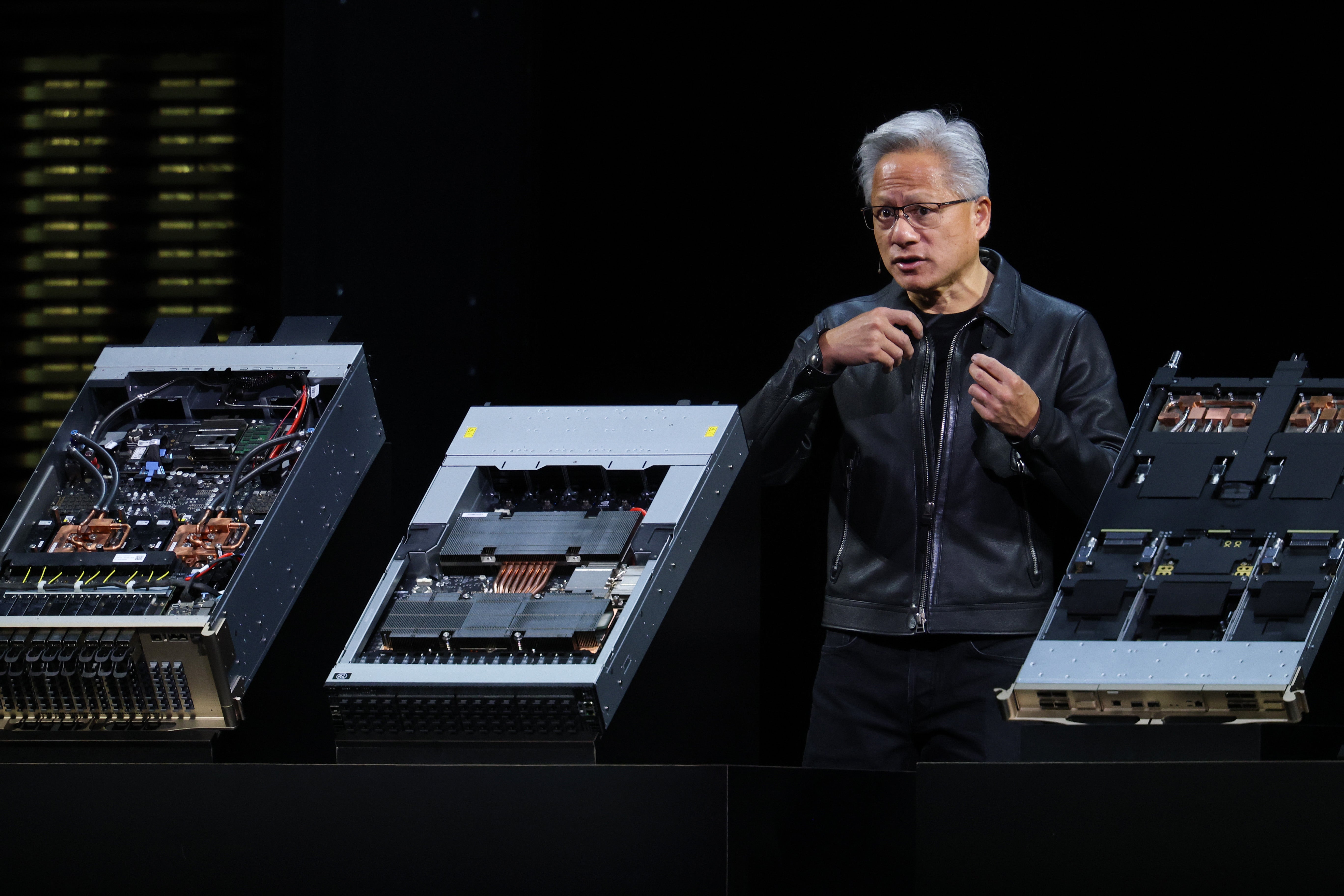 Nvidia President and CEO Jensen Huang speaks about NVIDIA Omniverse as he delivers the keynote address during the Nvidia GTC on October 28, 2025 in Washington, DC