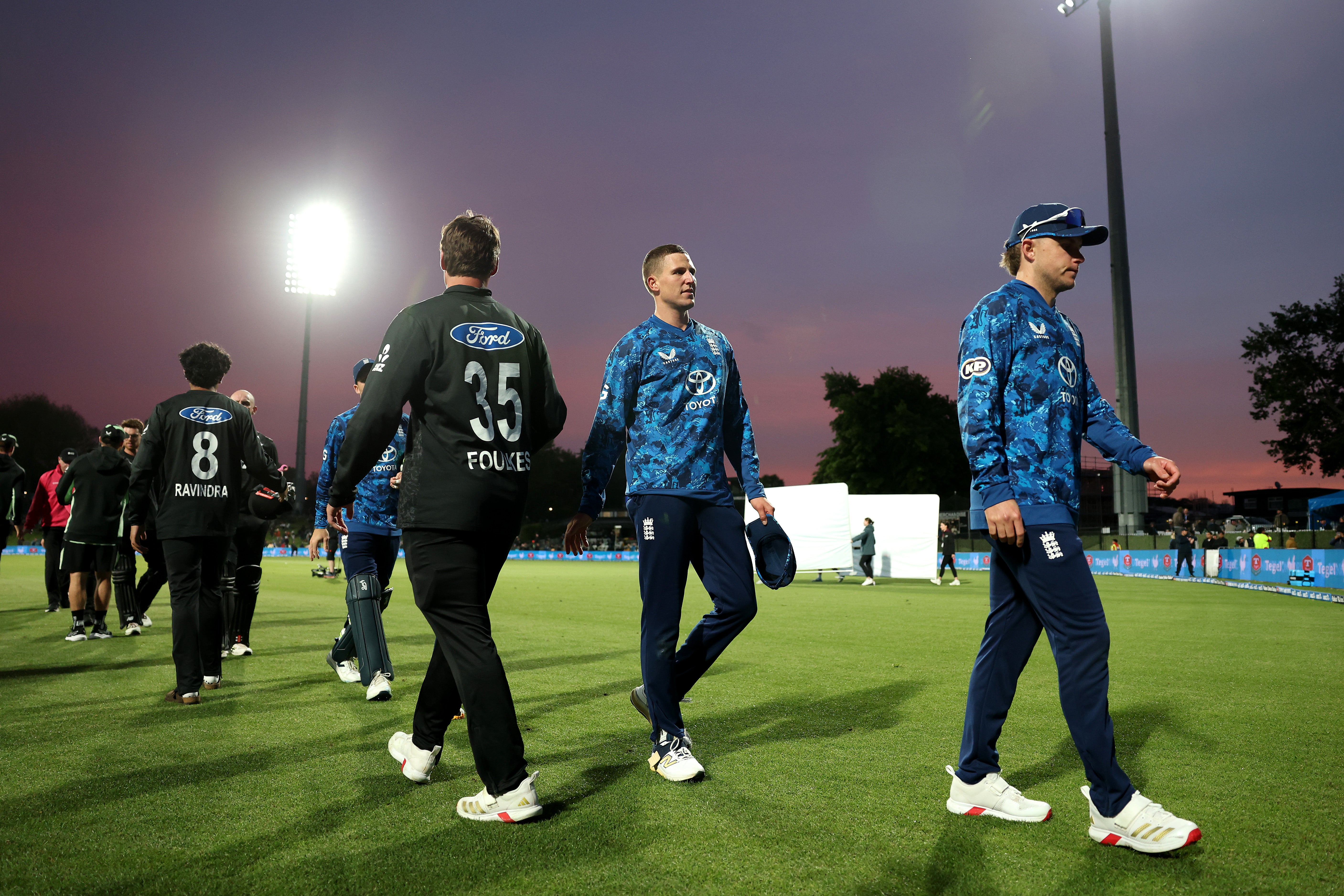 <p>England players leave the fielfd following the second One Day International match in the series between New Zealand and England</p>