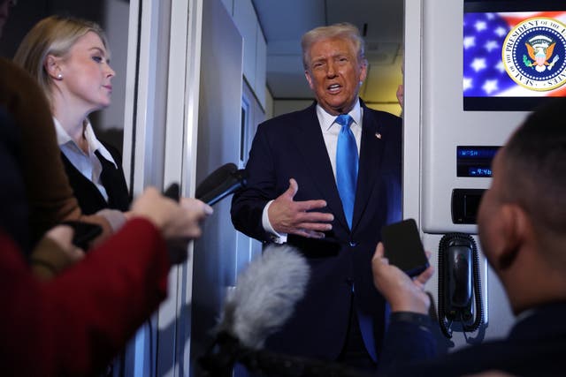 <p>President Donald Trump speaking to reporters aboard Air Force One en route from Japan to South Korea on Wednesday, a session in which he expressed disappointment about not being eligible for a third term in office</p>