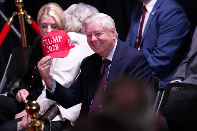 <p>The president has repeatedly entertained the idea of running for a third term, which has included Trump 2028 hats like the one Senator Lindsey Graham, a South Carolina Republican, is holding in this photo</p>