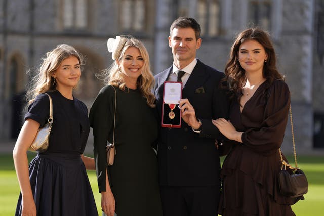 <p>Sir James Anderson, England Cricketer (2nd R), poses with wife Daniella (2nd L) and daughters Lola (R) and Ruby (L) after he was made a Knight Bachelor</p>